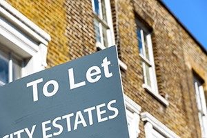 To Let sign on house